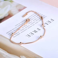 Kép 4/5 - Rosegold Nemesacél Női Karkötő - Gömb Medálokkal