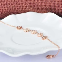 Kép 3/6 - Rosegold Nemesacél Női Karkötő - Virág Medálokkal