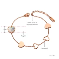 Kép 2/5 - Rosegold Nemesacél Női Karkötő - Szív Medálokkal - Kagyló Berakással