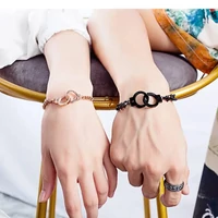 Kép 2/5 - Extravagáns Rosegold Acél Női Karlánc - Bilincs Zárral