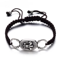 Kép 1/4 - Black Wolf - Barna Fonott Paracord Karkötő - Acél Liliom Címer