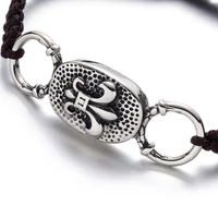 Kép 2/4 - Black Wolf - Barna Fonott Paracord Karkötő - Acél Liliom Címer