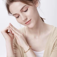 Kép 2/4 - Rosegold Nemesacél Csomó Mintás Női Karkötő