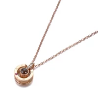 Kép 3/6 - Rosegold Nemesacél Női Nyaklánc - Szerelem 100 Nyelven Medál