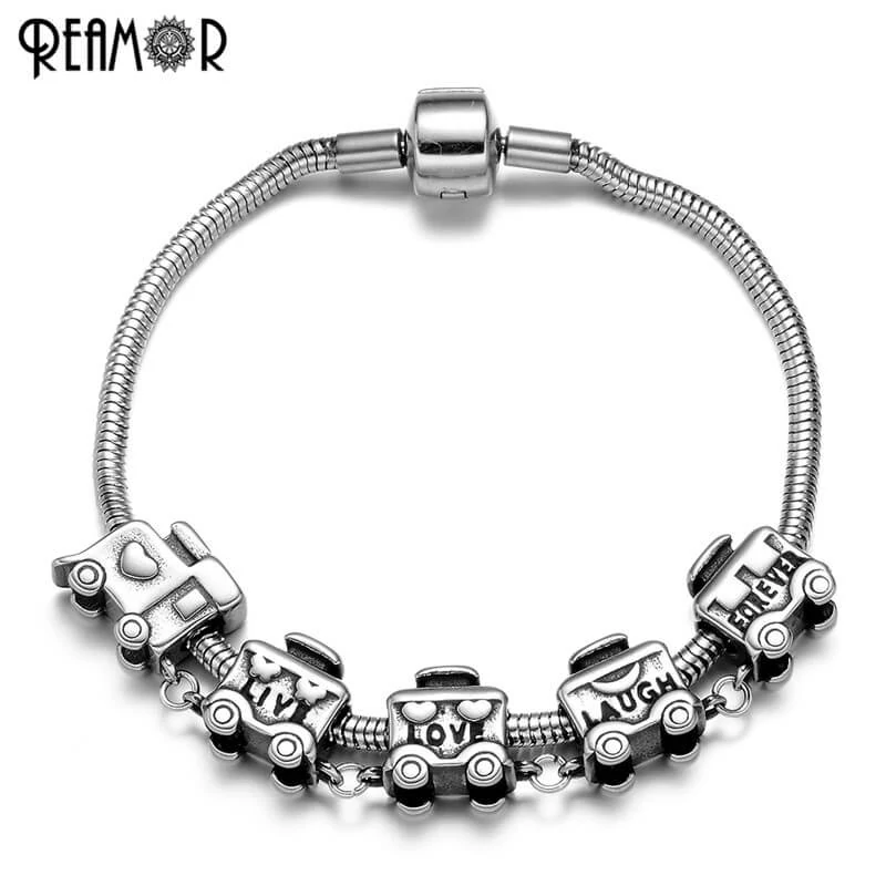 REAMOR – Nemesacél Charm Karkörő - Gőzmozdony Medállal